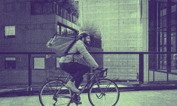 A person riding a bike outside.